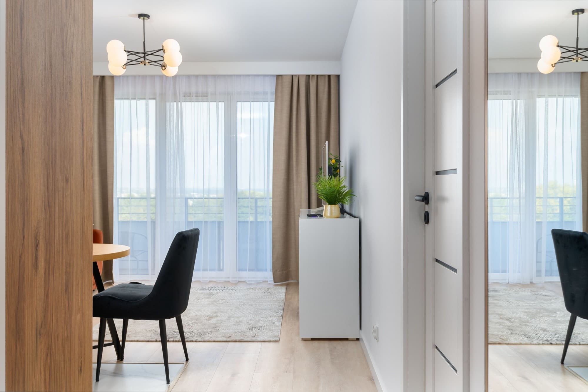 Bright, well-appointed apartment interior, representing right-sizing